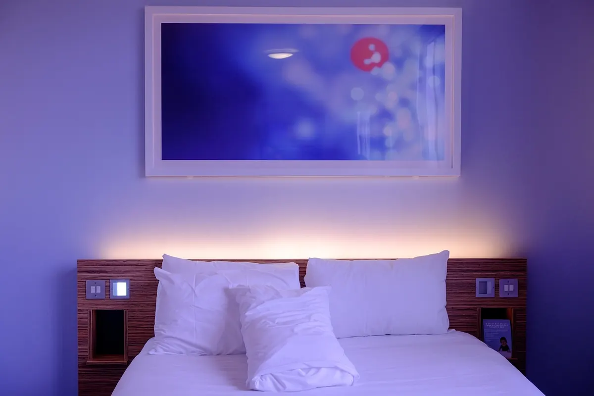 What Size Art Should Hang Behind a King Bed? A Bedroom Art Sizing Guide